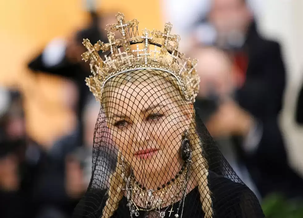 Madonna's tour postponed as she remains hospitalized for several days