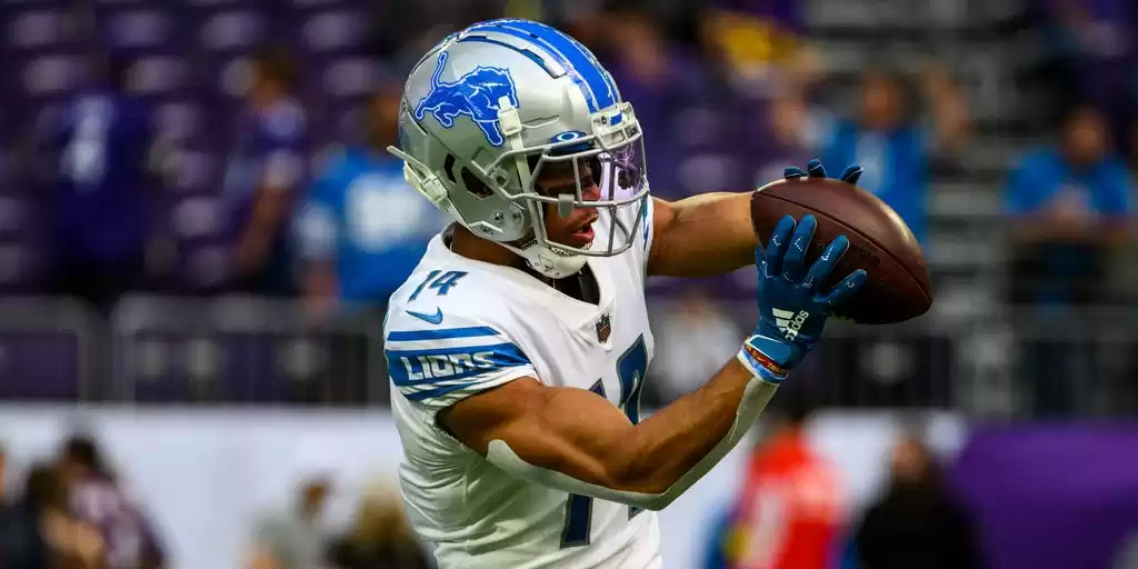 Amon-Ra St. Brown scores 2023 NFL season's first touchdown on Lions' fake punt