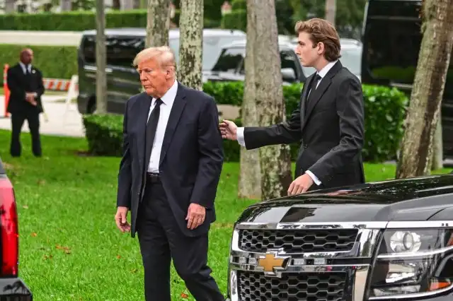 Barron Trump reaches out sad-looking father funeral Melania's mother