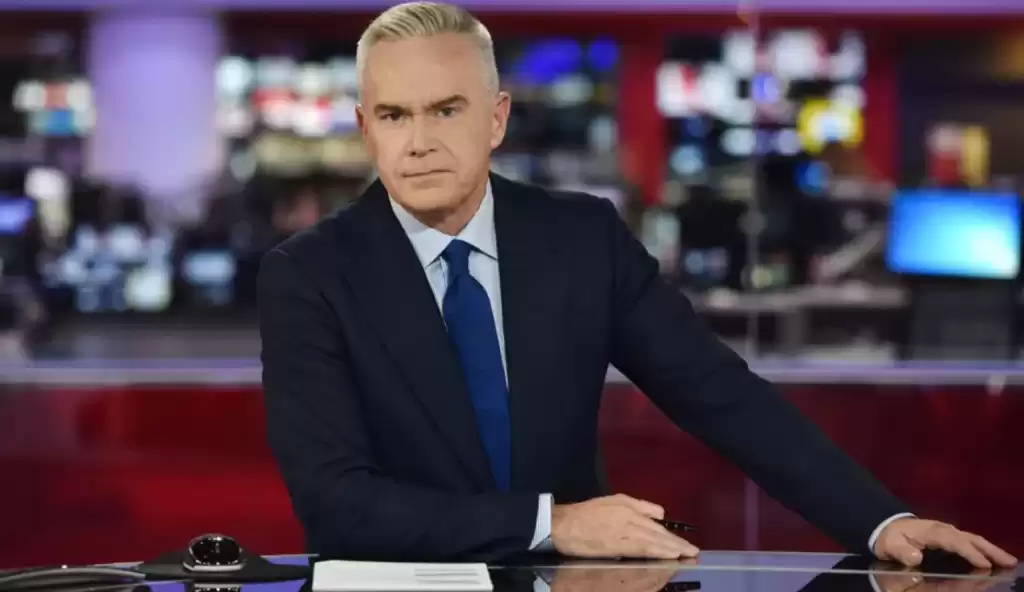 "BBC's Huw Edwards Seeks Guidance from Ex-Tabloid Editor on Allegations of Sex Photo Involvement"