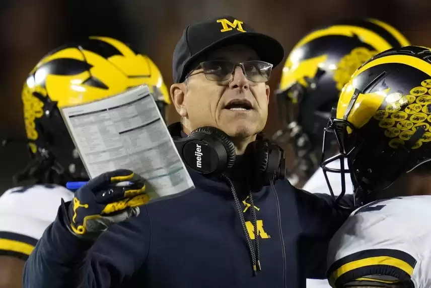 Big Ten bans Michigan Coach Jim Harbaugh for three games over sign-stealing allegations