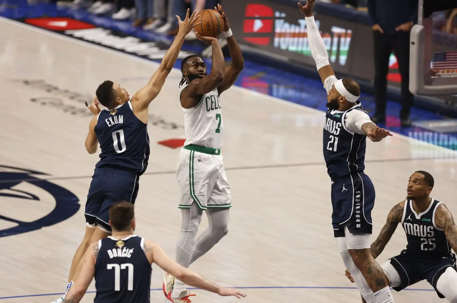 Celtics outlast Mavericks to maintain path towards NBA championship.