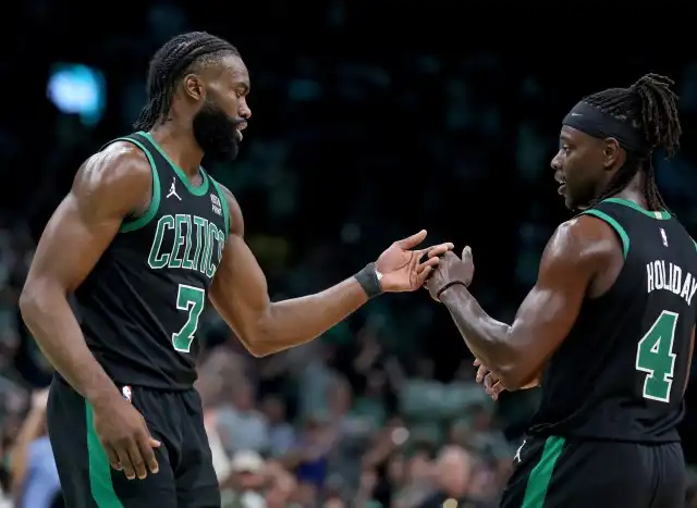 Celts guard Jrue Holiday connects with Jayson Tatum and Jaylen Brown