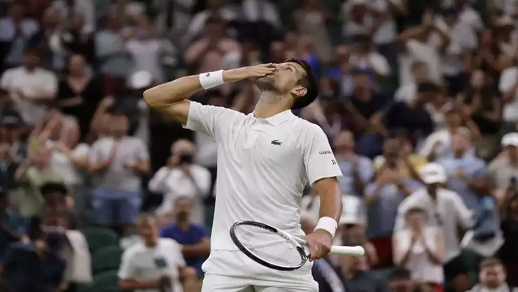 Djokovic emerges victorious against Wawrinka in nail-biting match