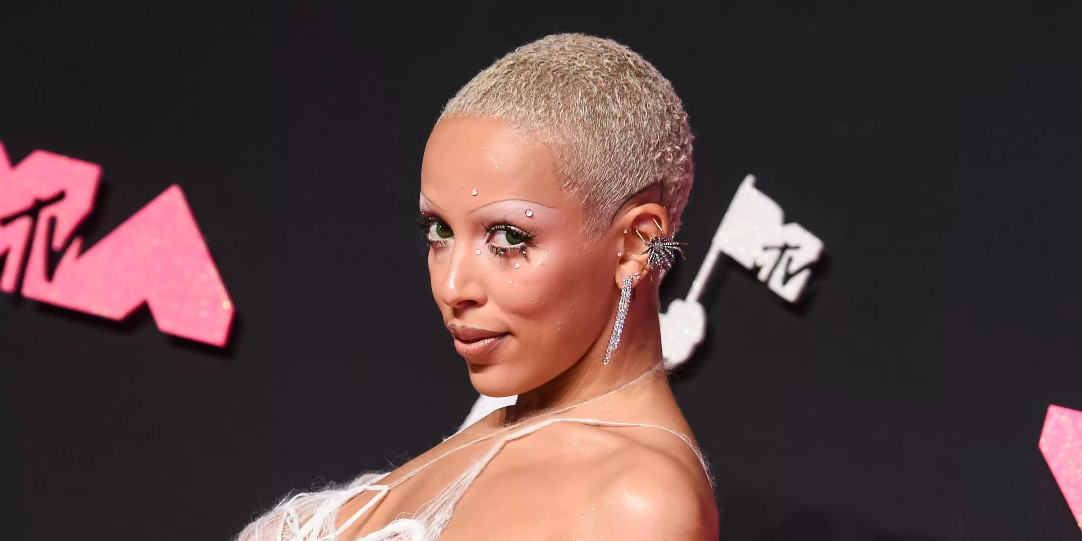 Doja Cat Stuns in Spiderweb Dress at VMAs