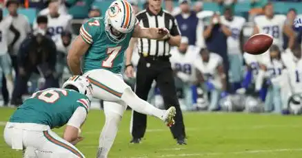 Dolphins beat winning team, need to win again to host playoff game