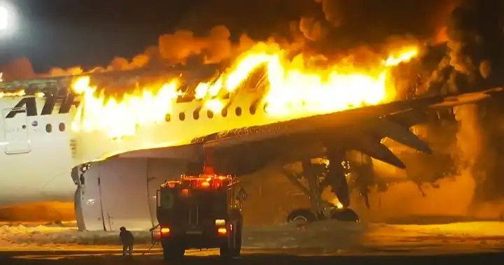Japan Airlines plane bursts flames collision Tokyo runway National