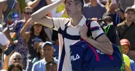 John Isner's US Open and tennis career end in a 5th-set tiebreak loss