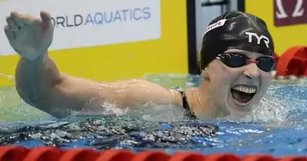 Katie Ledecky Clinches Gold in 1,500 at Swimming Worlds, Matching Michael Phelps' Record
