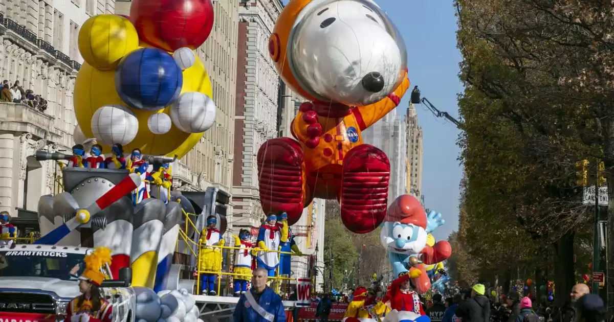 Macy's Thanksgiving Day Parade celebrates holiday season with balloons, bands and Santa in New York