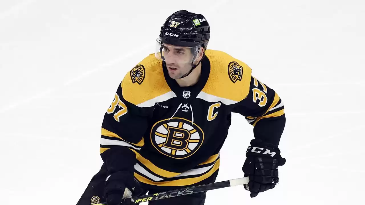 Patrice Bergeron and David Krejci, Newly Retired, Watch Bruins' Opener as Fans