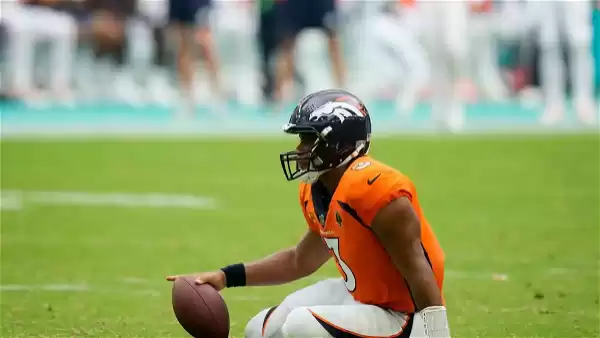 "The Dolphins: Tidal Wave Leaves Russell Wilson Feeling Washed, as Tua Tagovailoa Opens Eyes in the League"
